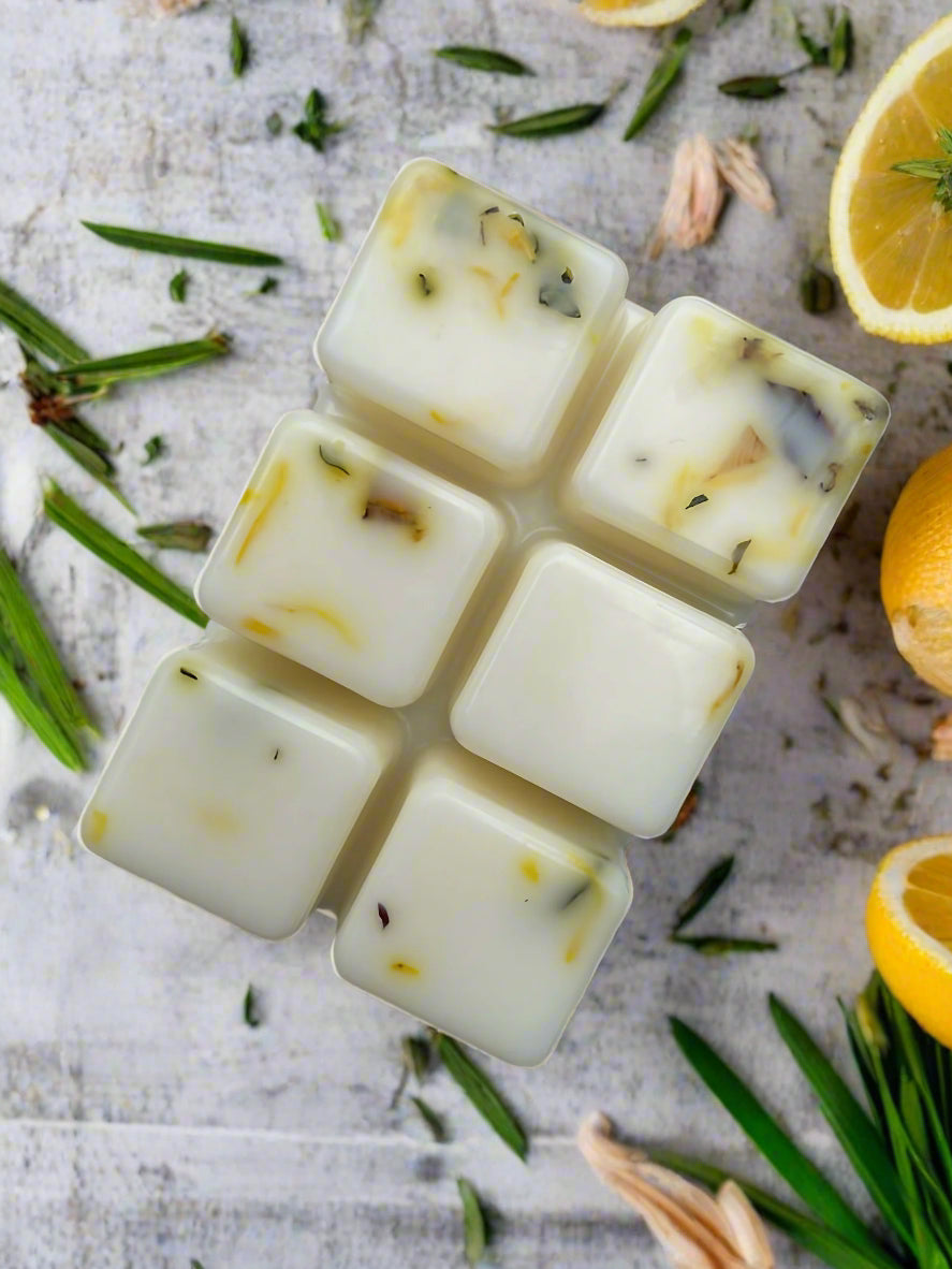 Lemon Verbena Botanical Wax Melt Bar with floral accents on a background of blooming cherry blossoms.