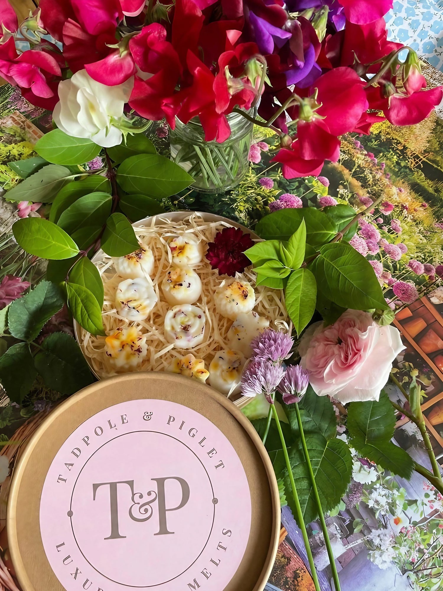 Pink packaging of Cottage Garden Botanical Wax Melts with floral accents