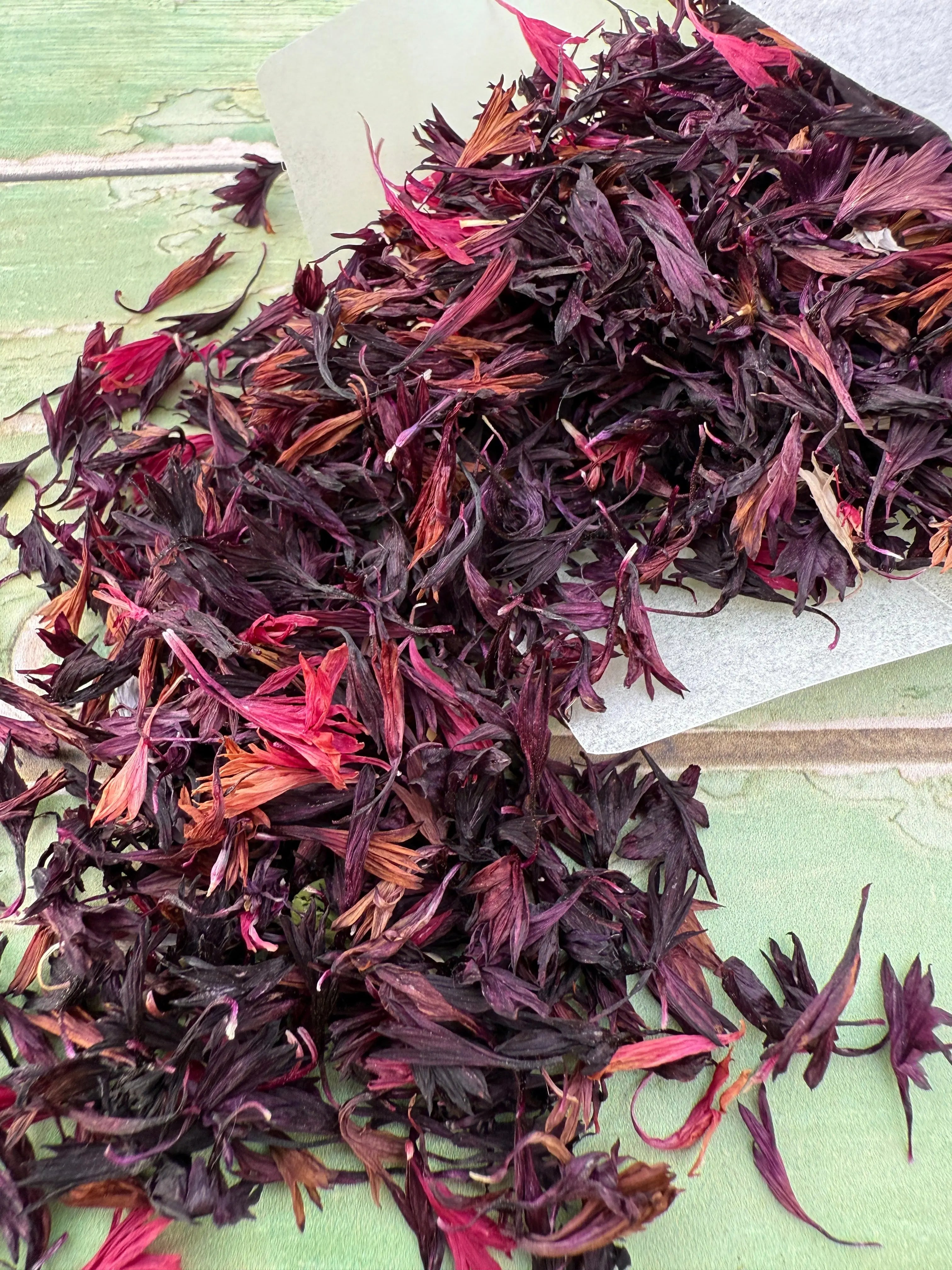A close-up of the mixed dried flower petals, showing cornflower