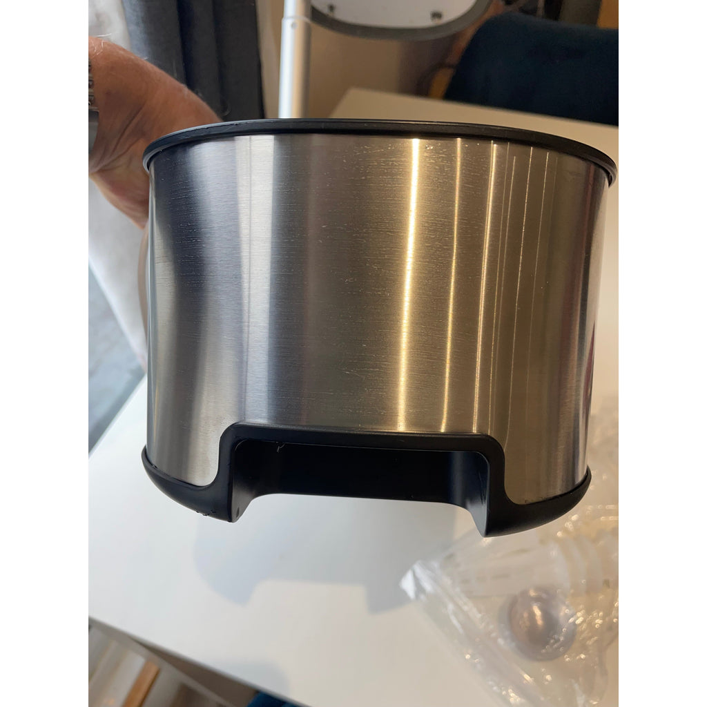 Close-up of the stainless steel 12 pod smart garden base with water inlet