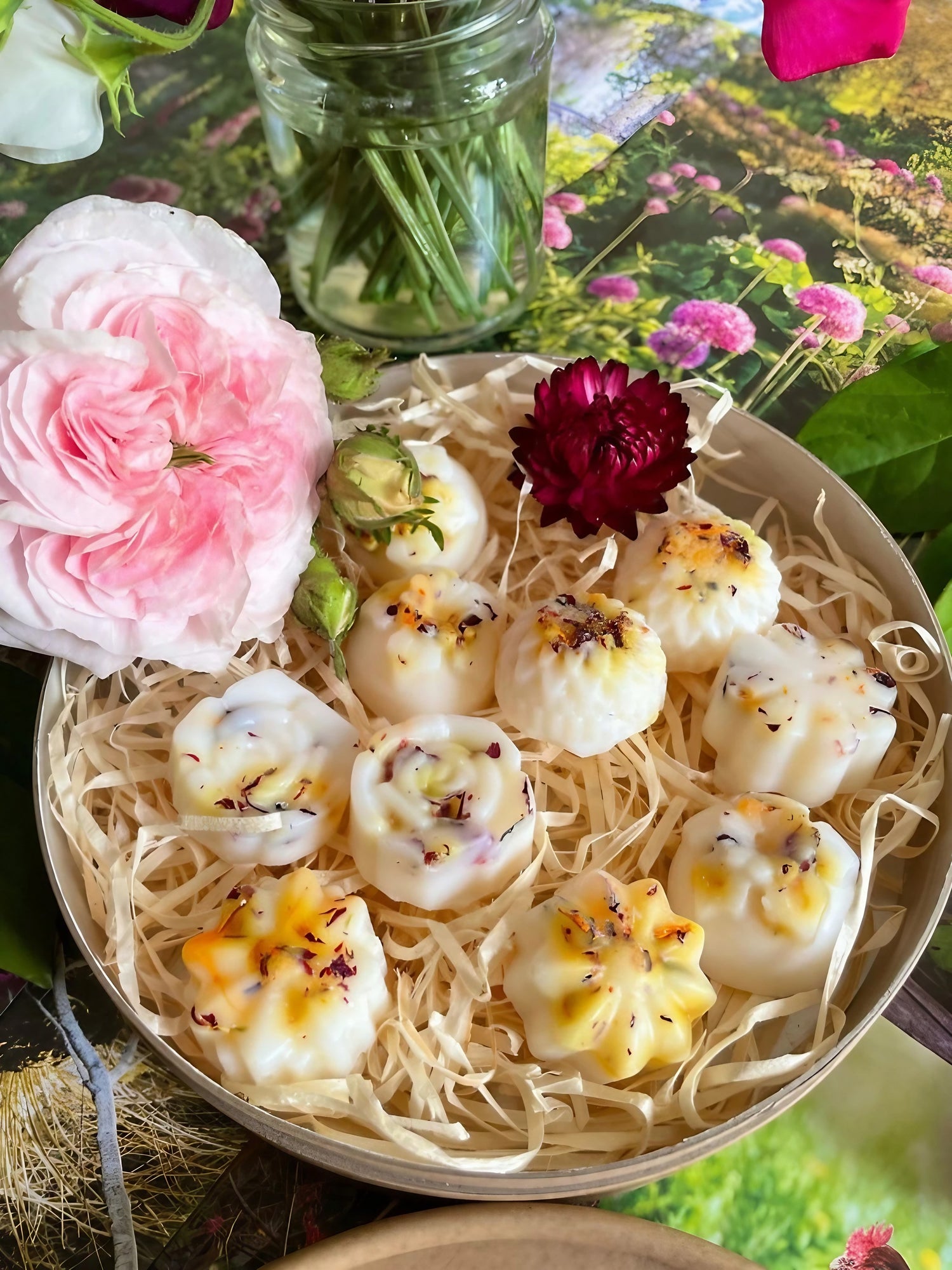 Wax melts with botanical garden scents displayed on a decorative plate