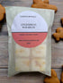 Gingerbread wax melt bar packaging featuring ginger, cinnamon, and clove scents, 80g from Tadpole & Piglet.