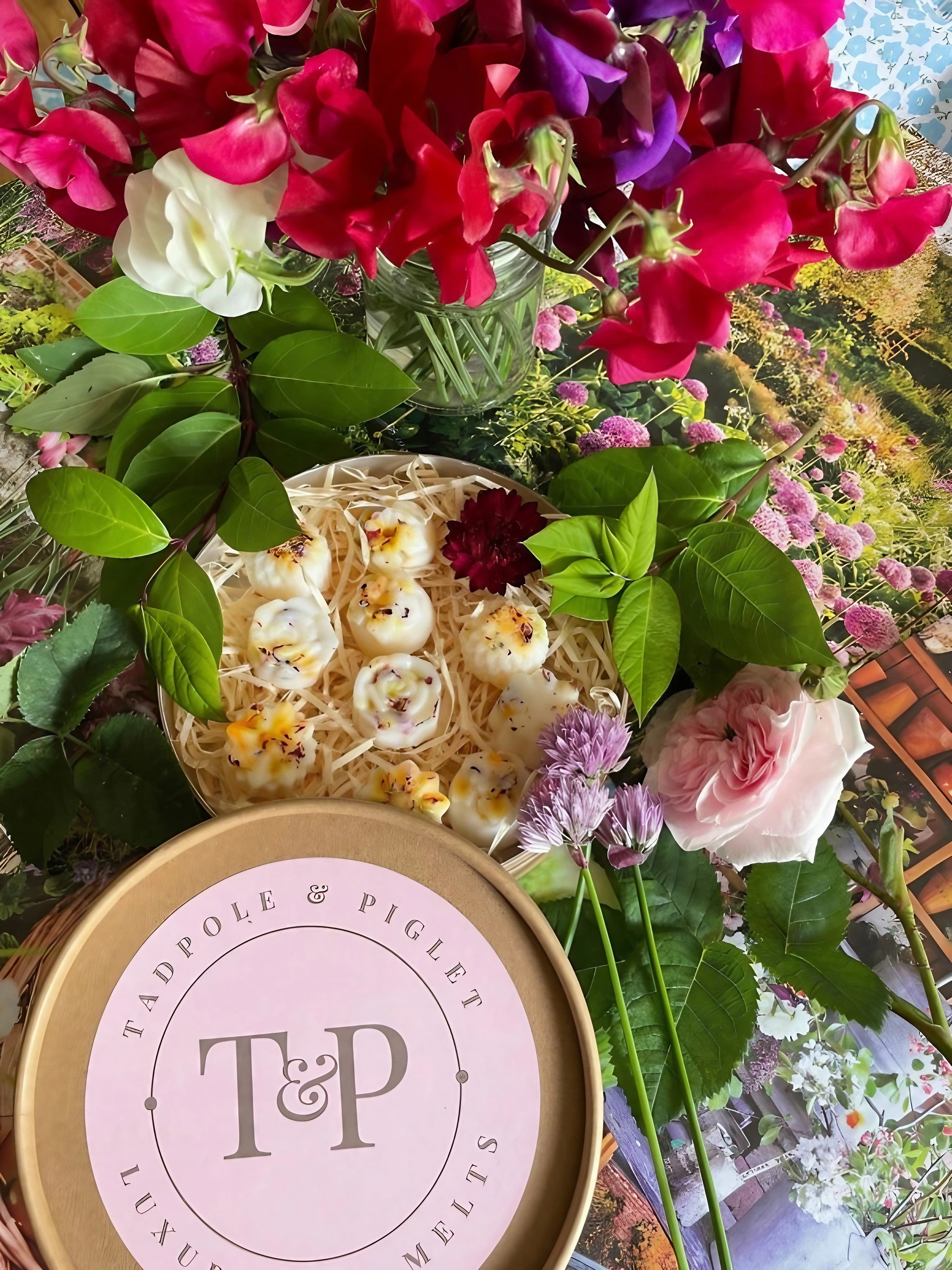 Pink packaging of Cottage Garden Botanical Wax Melts with floral accents