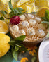 Botanical wax melts in a decorative box with lemon and herbs, ideal for refreshing and focusing the mind.