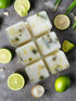 Botanical wax melt bar featuring lemongrass and ginger, set against a floral background.