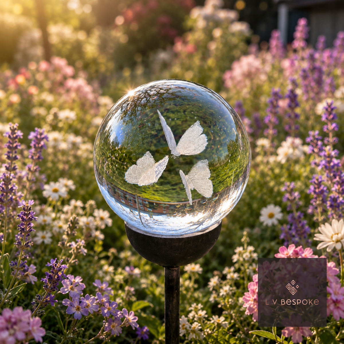 3D orb with etched butterflies among purple and pink flowers