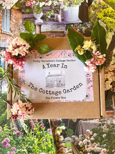 Product packaging with floral decorations and text 'A Year In The Cottage Garden' amidst garden-themed collage.