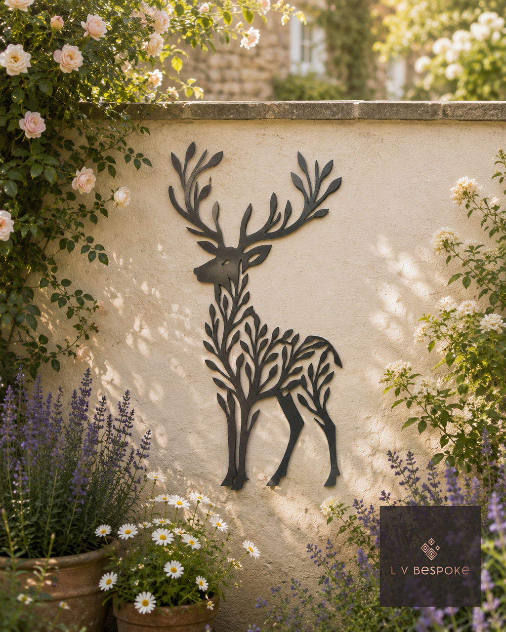 Metal stag with leafy antlers wall art on a garden wall