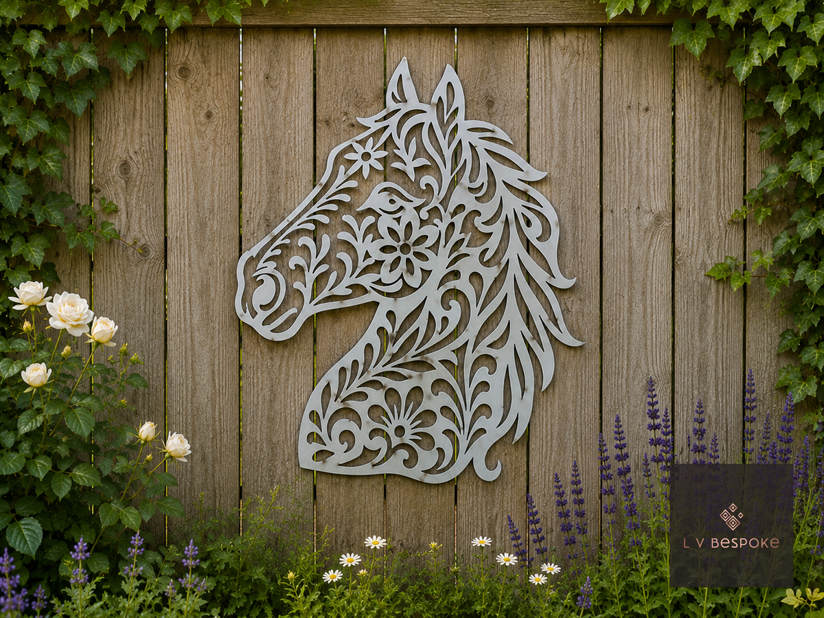 Metal horse head wall art on a wooden fence