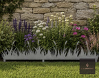 Metal lawn edging with a grass cut-out below a stone wall border