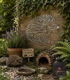 Geometric metal hedgehog wall art above a hedgehog house