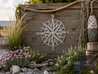 Metal compass rose wall art on a weathered wooden wall