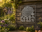 Square metal hedgehog wall art on a wooden garden fence
