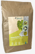 A brown paper bag labeled ladybirdplantcare.co.uk InsectoNet Plastic Free Netting displays icons for biodegradable, plastic-free, and reusable insect netting. The eco-friendly packaging features a lettuce leaf on the front.