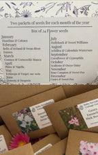 The "A Year in a Cottage Garden - Flower Box (24 Packs)" by Bishy Barnabees Cottage Garden Ltd features two labeled seed packets for each month, showcasing hardy annuals and cut flowers—ideal for planning your cottage garden.