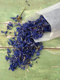 A bag of natural blue dried flower petals from Bishy Barnabees.