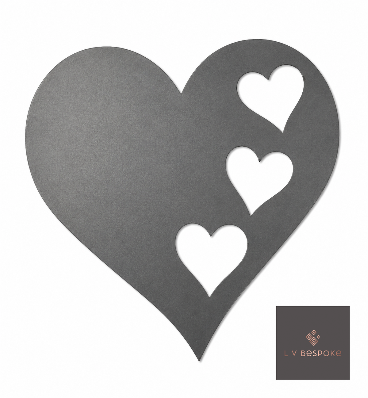 Cut steel heart with three small heart cut-outs