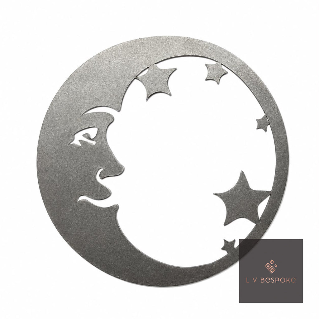 Cut steel moon face with stars topper