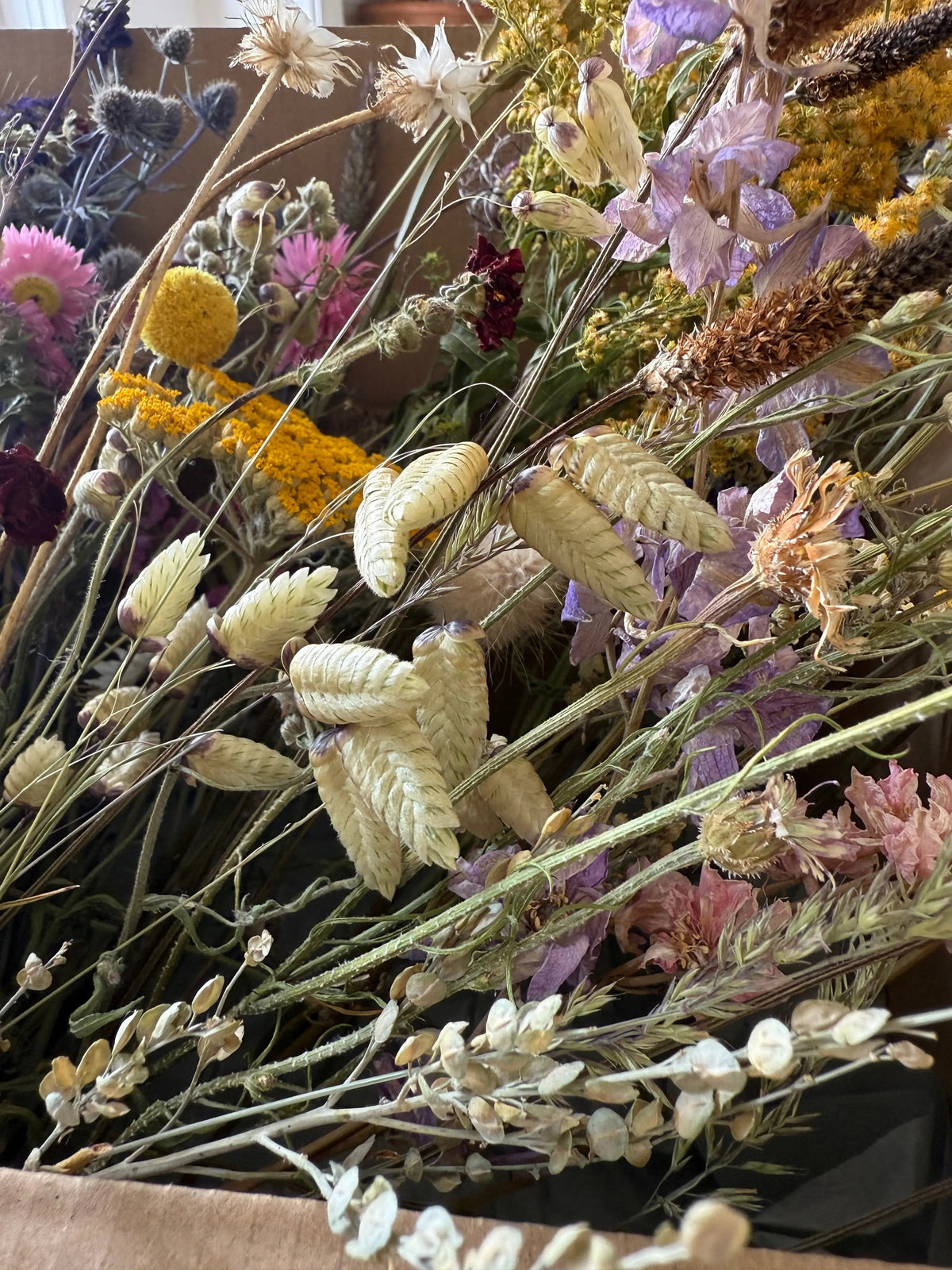 Dried Flower Craft Box – close-up of yellow, pink, purple and cream dried flowers and grasses