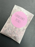 Dried Flower Petals – bag with a pink Cornflower Petals label on dark slate