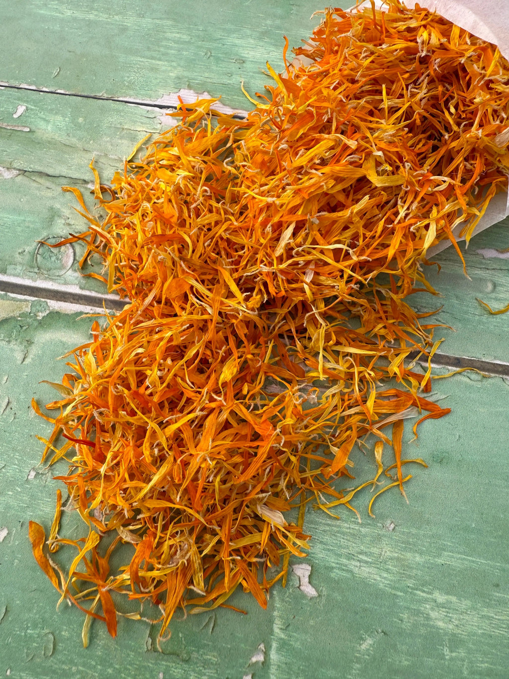 Dried Flower Petals – close-up of mixed petals showing orange calendula