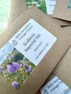 Floriography: The Little Box of Love – seed packets with purple flower pictures