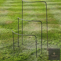 Three metal half-hoop plant supports in graduated sizes on a lawn