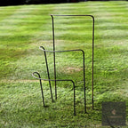 Metal half-hoop plant supports in three heights on a lawn