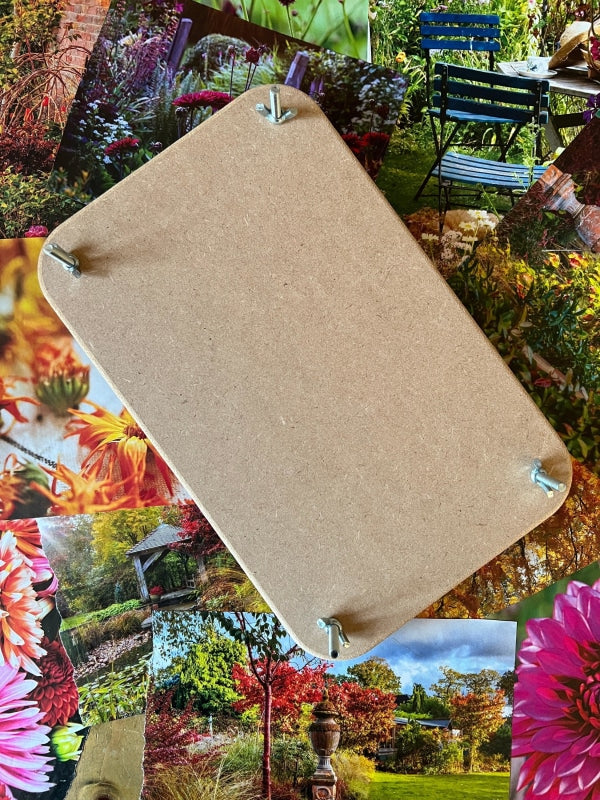 Wooden flower press on a vibrant background of flower photos, showcasing its sturdy MDF design and assembly bolts.