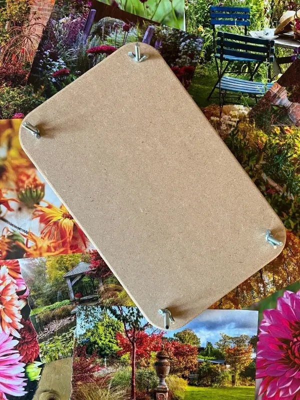 The Bishy Barnabees Cottage Garden Wooden Flower Press - Standard features plain brown wood and four metal screw hooks in each corner, shown atop a collage of colorful flower photos—ideal for your next flower pressing project.